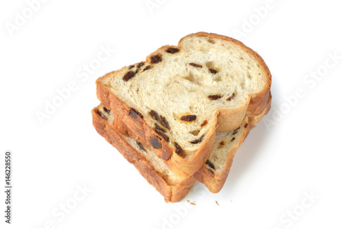 Raisin bread sliced on white background - isolated