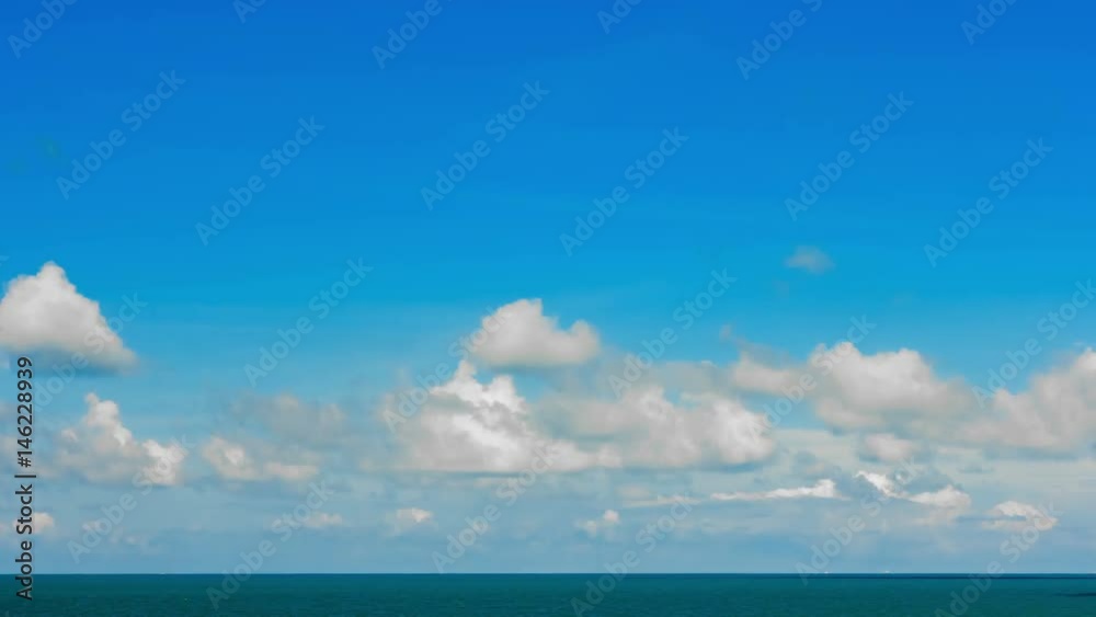 4K. Timelapse Moving clouds over the sea on a background of blue sky 4K. Timelapse Moving clouds over the sea on a background of blue sky