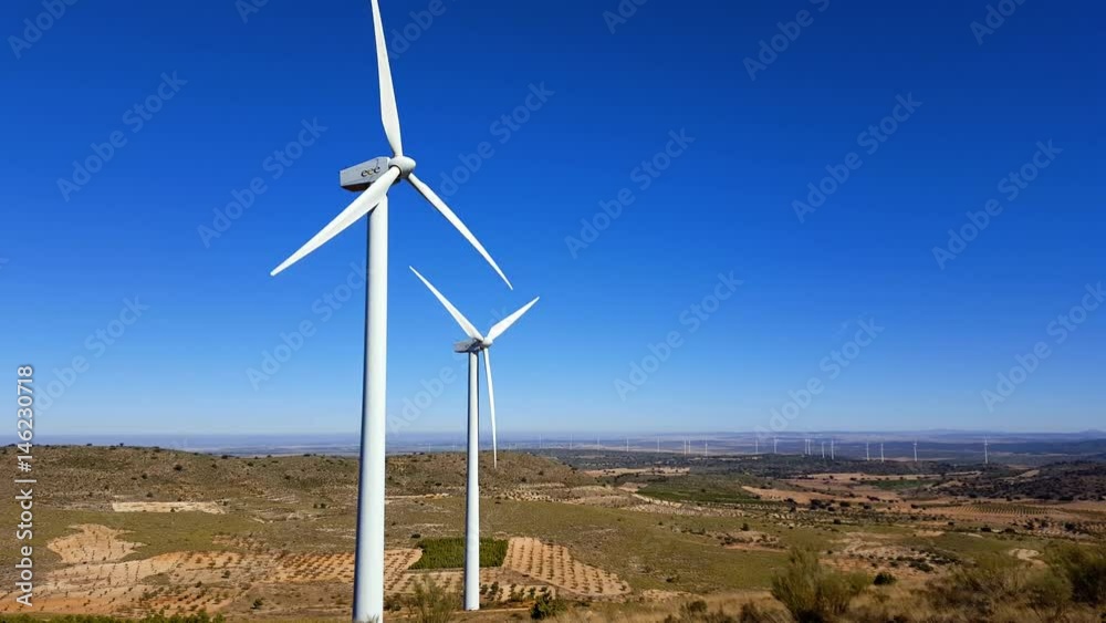 Wind turbines in Castilla La Mancha, Spain. View of the field in the background.