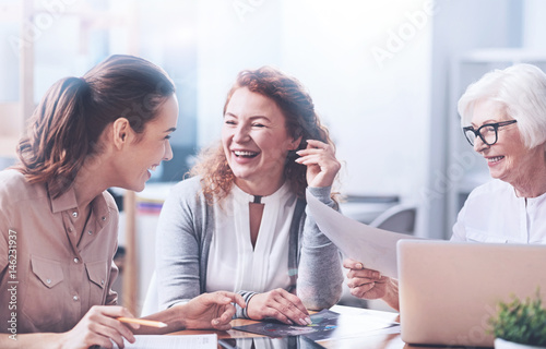 Happy women working in the office photo