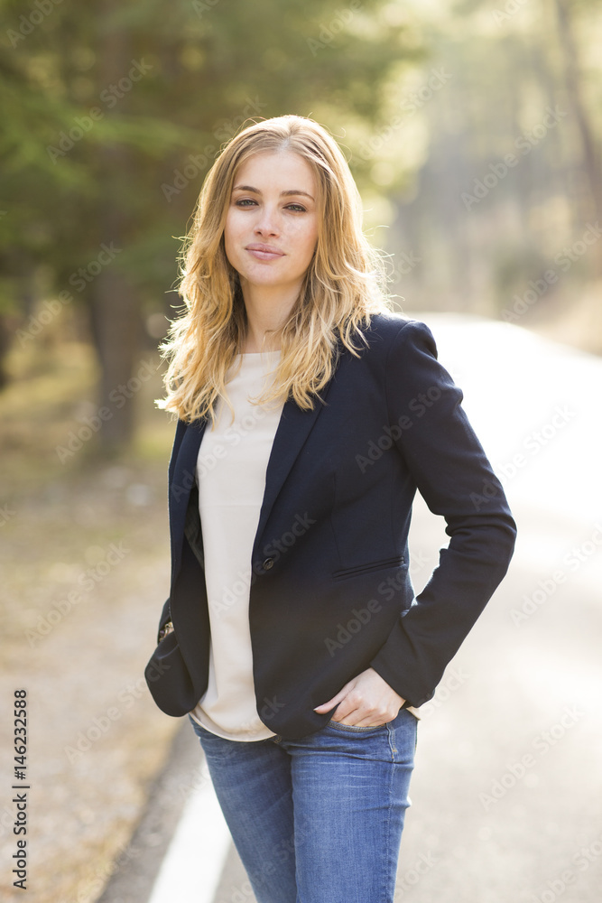 Image of pretty businesswoman looking at camera on natural space Image of pretty businesswoman looking at camera on natural space