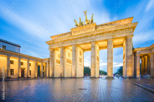 The long exposure image of Brandenburg Gate in Berlin city, Germany photo