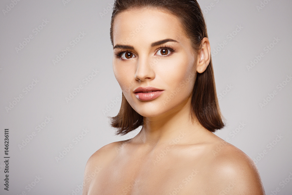 Stunning girl with nude make up at studio Stunning girl with nude make up at studio