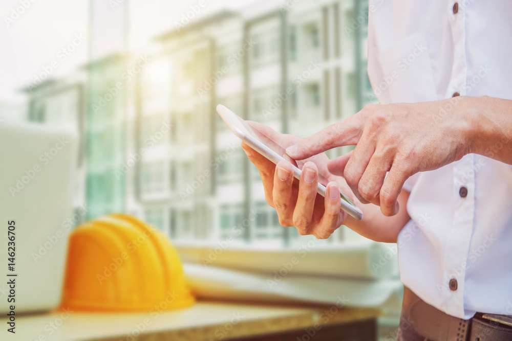 Obraz premium mobile concept.Business man hands holding touch screen smartphone 