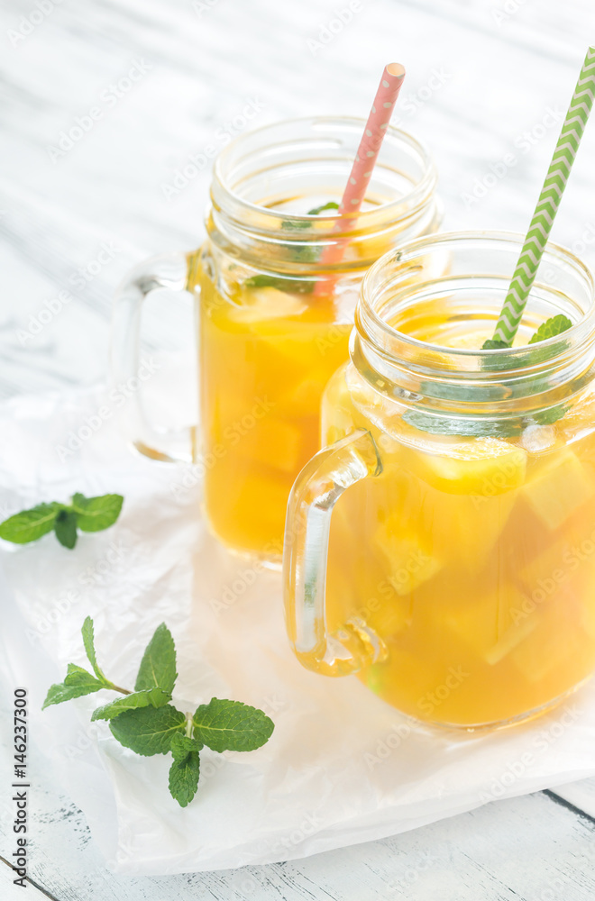 Mango juice in mason jars Mango juice in mason jars