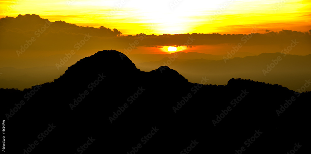 Silhouette of mountain on sunset time