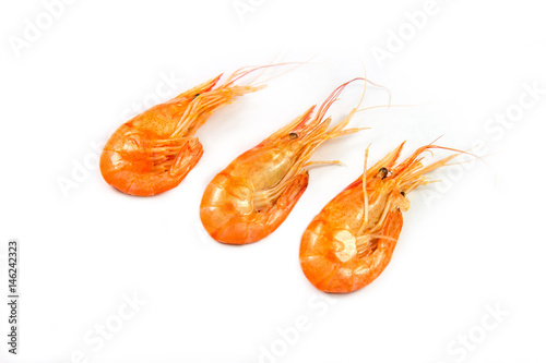Three boiled shrimps isolated on white background