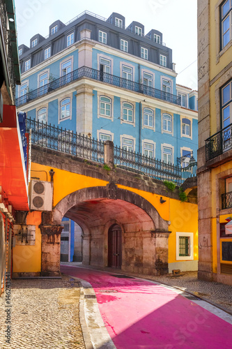 The famous pedestrian Pink street of Rua Nova do Carvalho in the Cais do Sodre area of Lisbon, Portugal photo