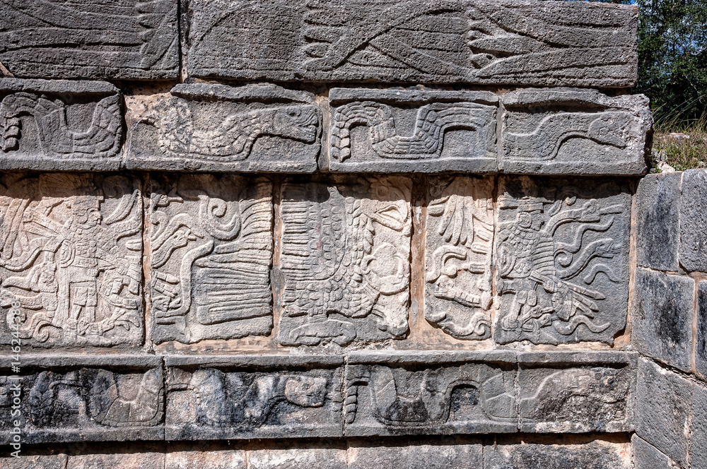 Well preserved bas-relief detail of Mayan ruins at Chichen Itza, Mexico
