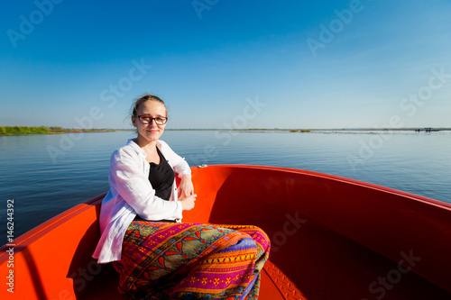 Girl in Red Lotus Lake