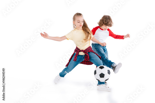 Children playing football © LIGHTFIELD STUDIOS