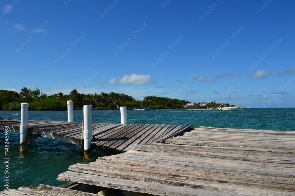 Pier Destroyed by Hurricane with Crystal Clear Caribbean Waters, Caye Caulker, Belize