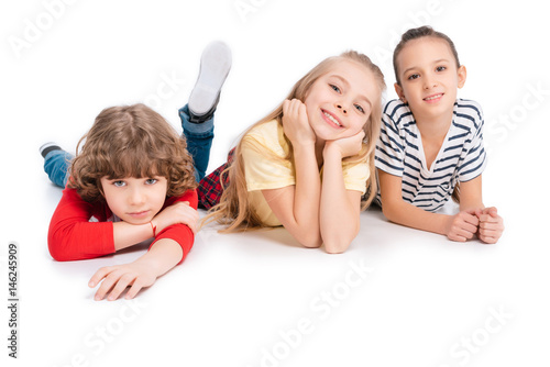 Group of friends lying on floor