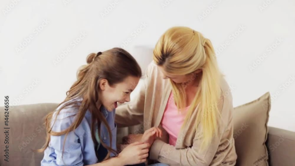 happy family having fun and tickling at home happy family having fun and tickling at home