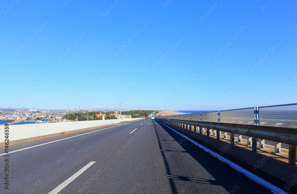 Asphalt road and blue sky