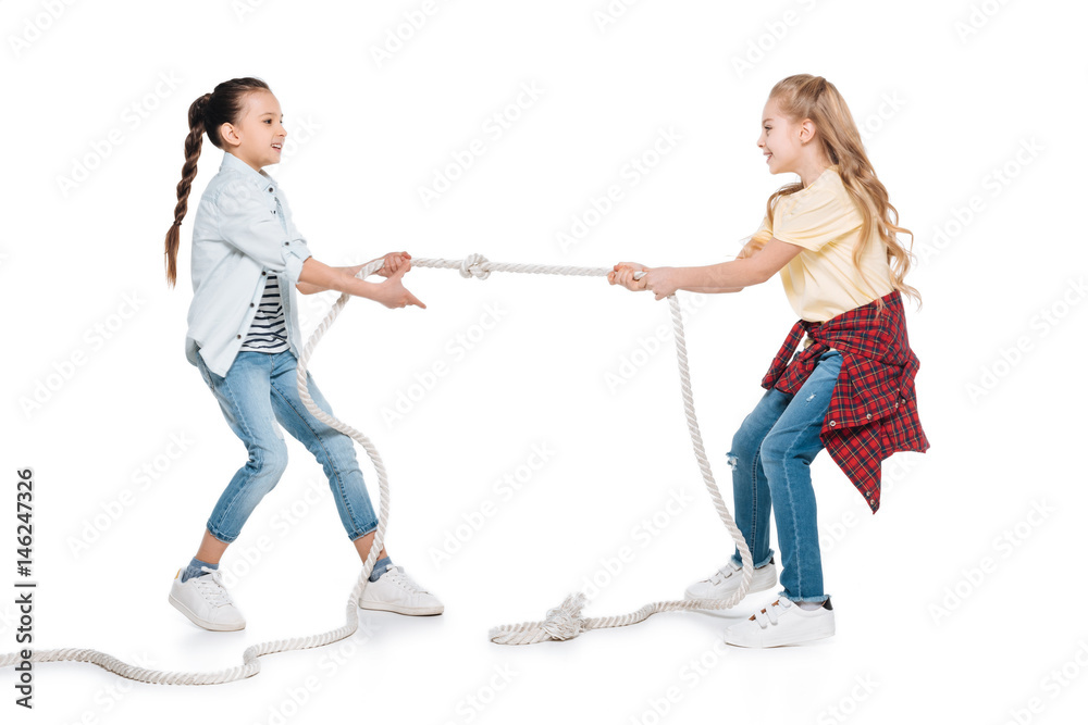 Girls play tug of war