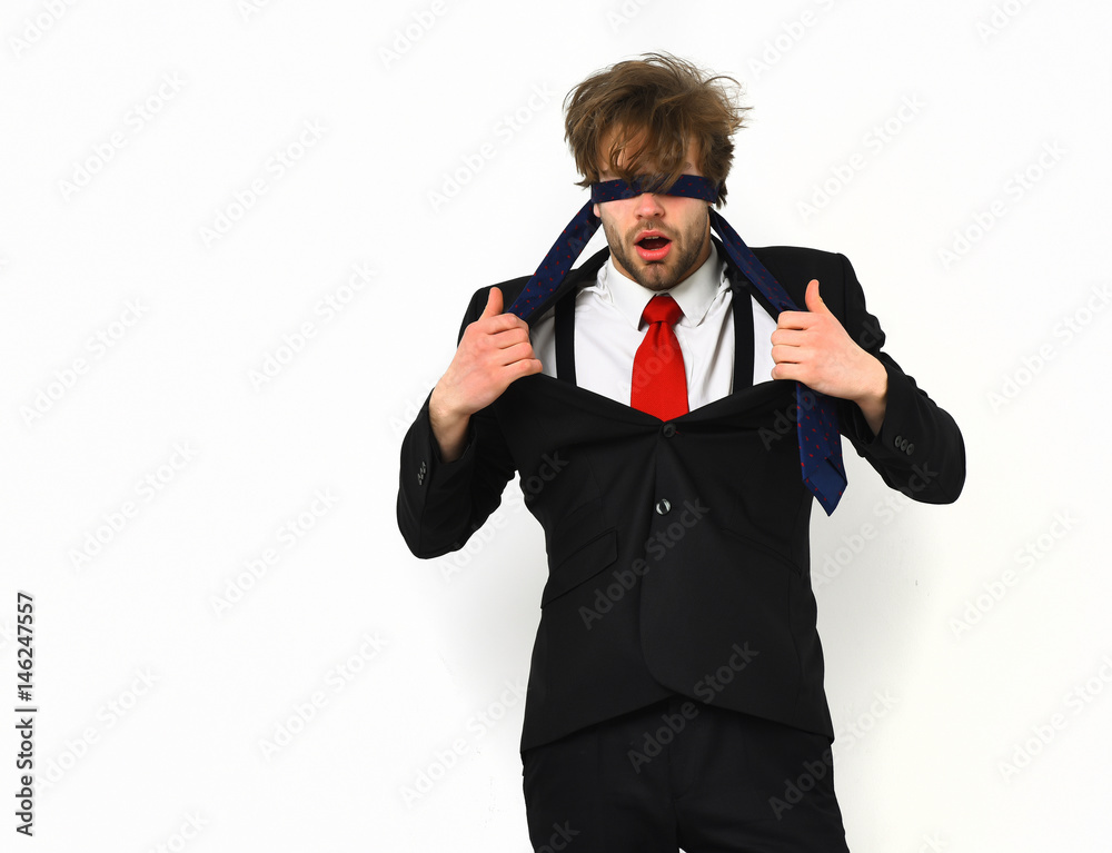 Bearded macho stylish man in elegant suit with blindfold eyes Bearded macho stylish man in elegant suit with blindfold eyes