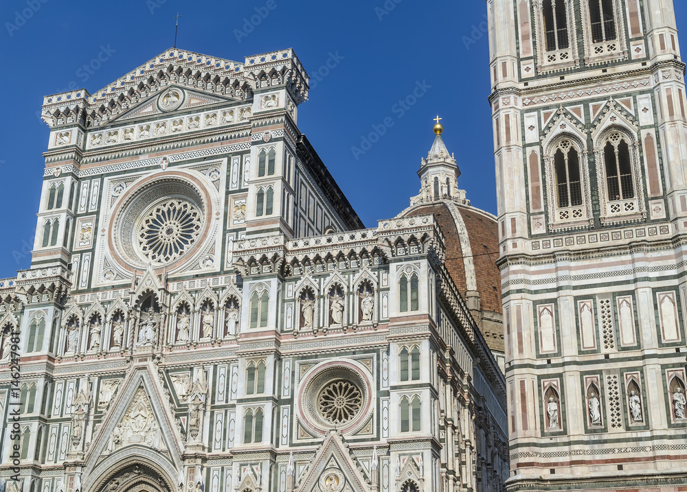 Detail of the facade of the famous Cathedral of Santa Maria del Fiore, Duomo of Florence, Italy, on a sunny day