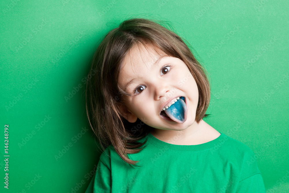 Little girl with blue tongue Stock Photo Adobe Stock