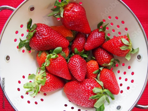 Strawberries in the white strainer © Agnieszka