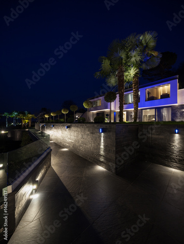 Exterior of luxurious modern villa, night scene © alexandre zveiger