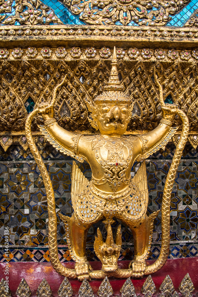 Wat Phra Kaew. Temple of the Emerald Buddha is regarded as the most sacred Buddhist temple in Bangkok Thailand.