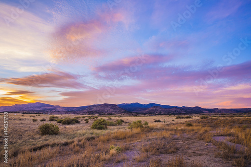 Fotografia, Obraz sunset over desert mountains