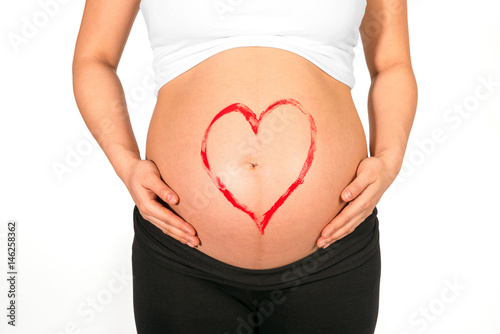 Wallpaper Mural Red heart painted on belly of pregnant woman Torontodigital.ca
