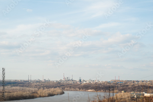A huge processing plant in the distance,