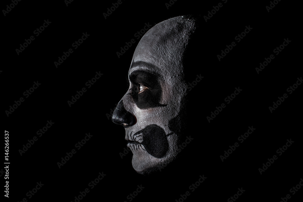 Naklejka premium Beautiful man with creative make-up for the Halloween party