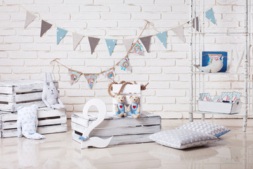 Decor in the style of sea travel. Sea thematic photo session decoration of a daylight studio. Beautiful decoration for birthday party