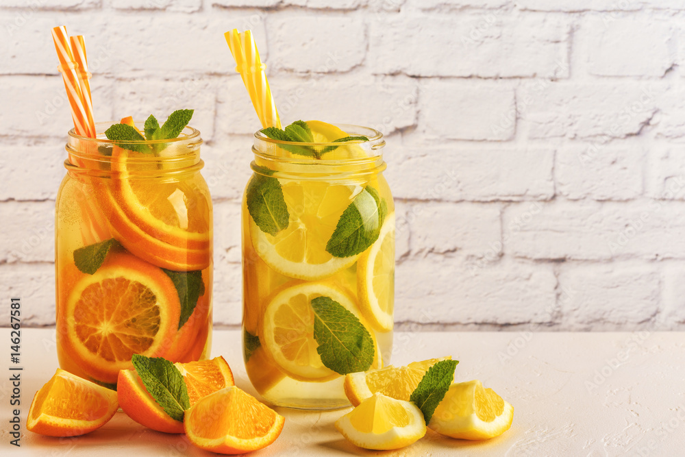 Fototapeta premium Detox fruit infused water. Refreshing summer homemade cocktail.