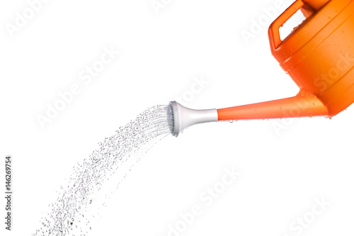 Photo Watering can in action on white background