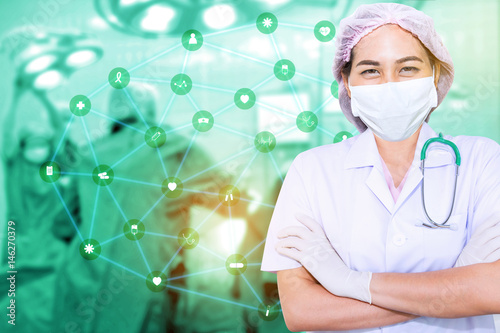 Team of surgeon in uniform perform operation on a patient and  information, with modern computer interface background.