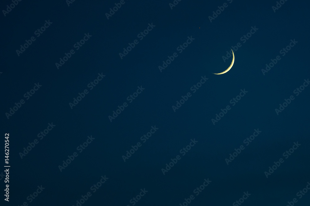 new waxing moon in the night sky, the first day of the new moon new waxing moon in the night sky, the first day of the new moon