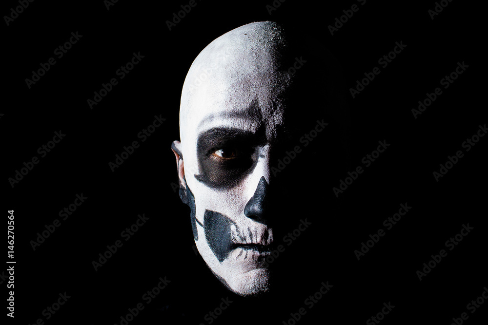 Naklejka premium Beautiful man with creative make-up for the Halloween party