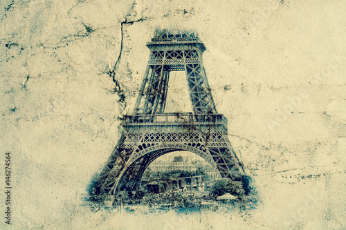 Eiffel Tower in Paris. Vintage view background. Tour Eiffel old retro style photo with cracks crumpled paper.