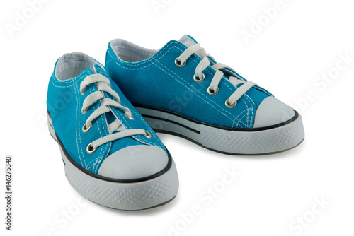 Blue children's sneakers isolated on a white background