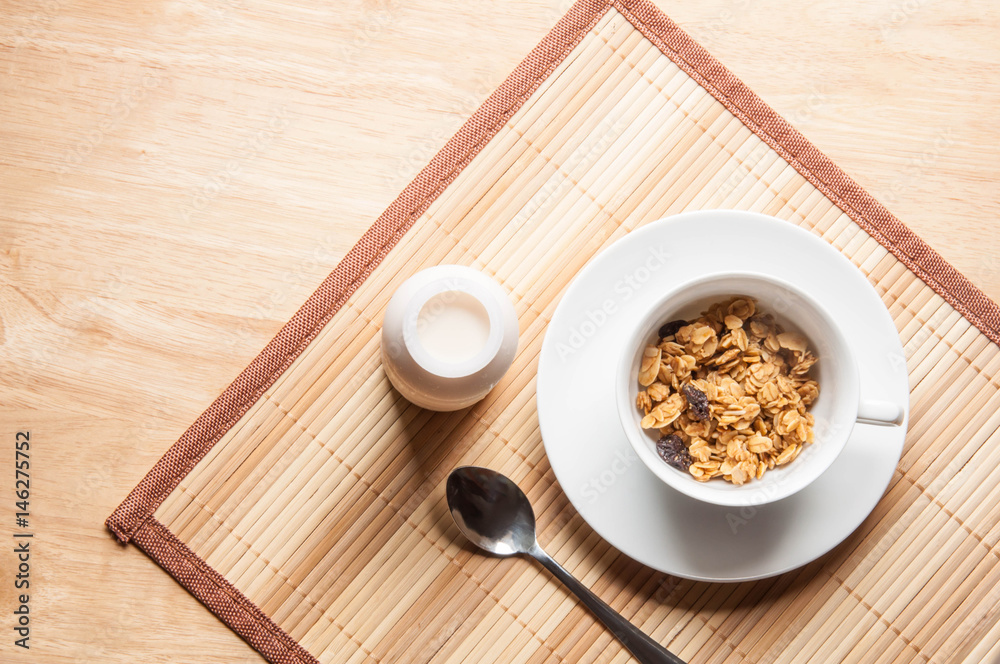 cereal and milk on wooden table breakfast in the morning cereal and milk on wooden table breakfast in the morning