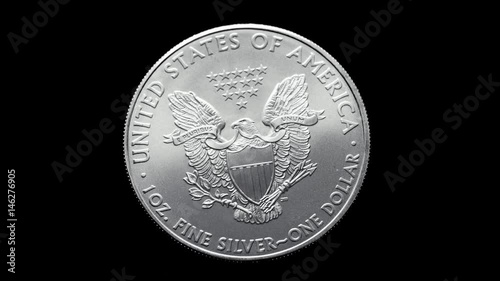 close-up shot one dollar silver eagle coin rotating