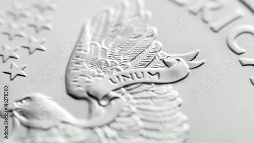 close-up shot one dollar silver eagle coin tracking photo