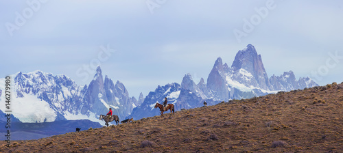Gaucho riding against the background of Mount Fitz Roy, Patagonia, Argentina