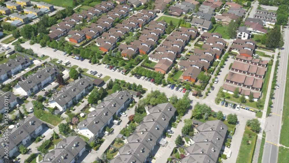 The views of the European modern village near an old town in a natural forested area, aerial, 4K - 4