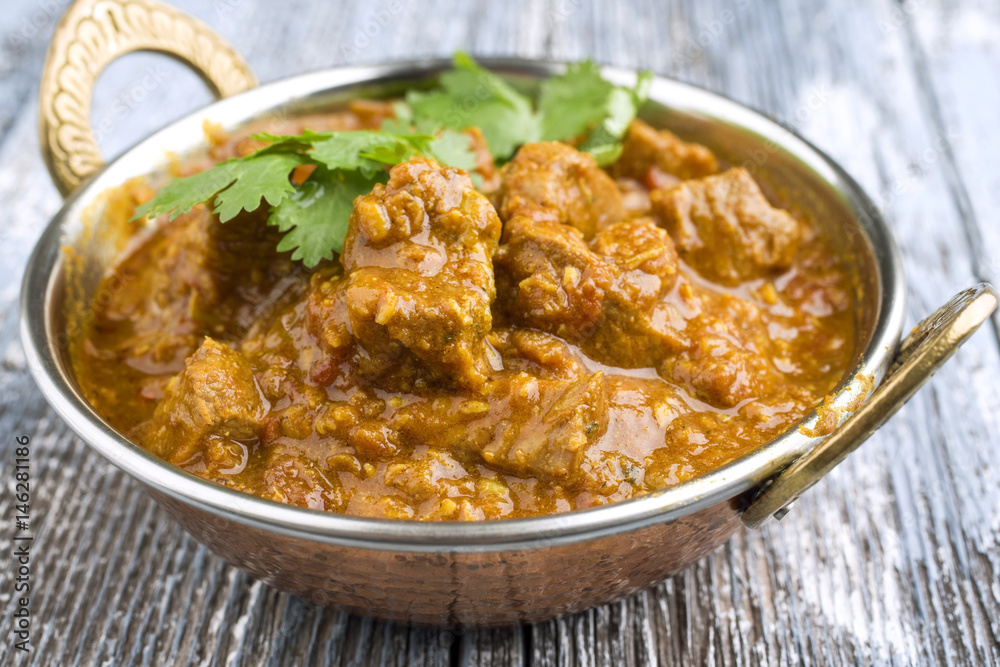 Traditinal Indian Lamb Curry as close-up in Korai Traditinal Indian Lamb Curry as close-up in Korai