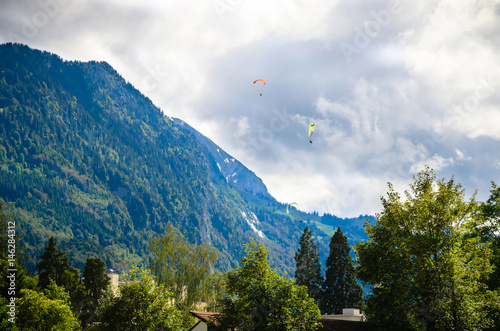 Beautiful landscape with paragliders  in Interlaken  Switzerland
