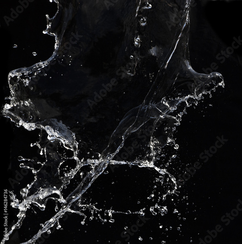 Water splash on black background
