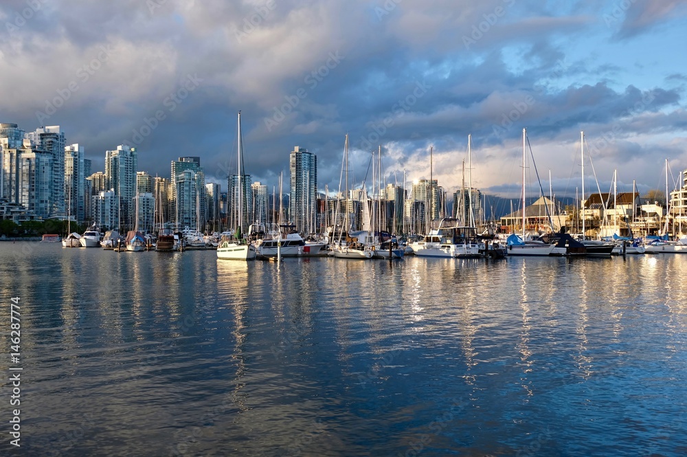 Vancouver skyline at sunset. Boats in False Creek. Vancouver. British Columbia. Canada.