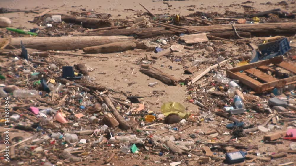 Pollution on a tropical beach, garbage washed ashore on a small beach, The Netherlands - 3 Pollution on a tropical beach, garbage washed ashore on a small beach, The Netherlands - 3