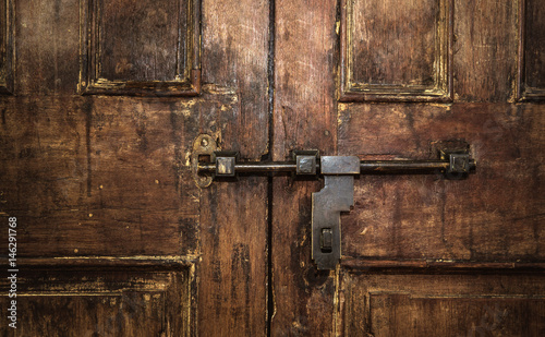 Closed Old vintage wood Door with door lock