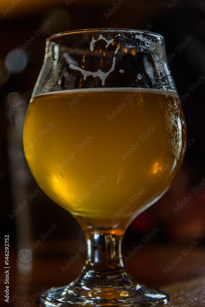 closeup of beautiful glass of IPA craft beer closeup of beautiful glass of IPA craft beer